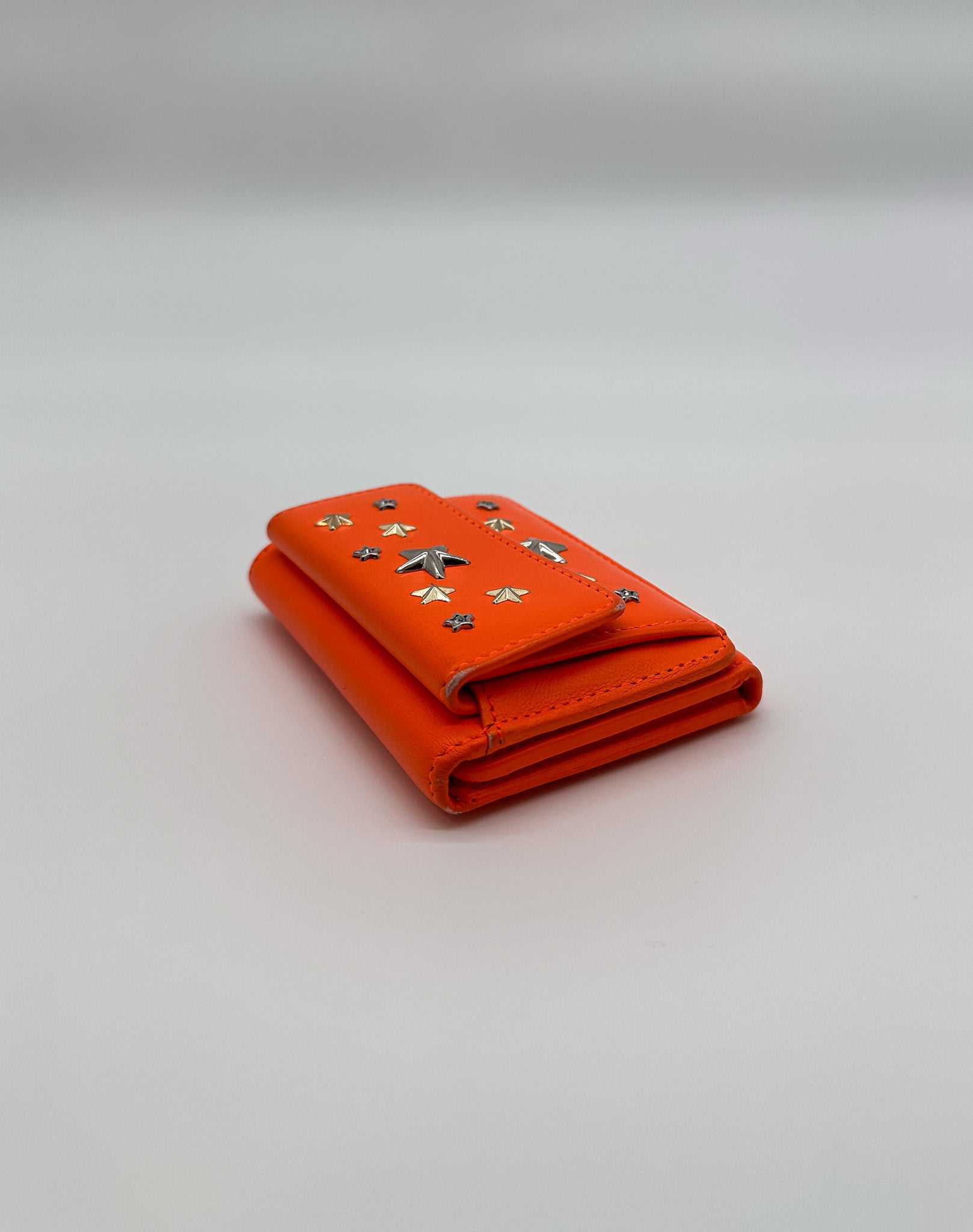 Jimmy Choo Orange Star Studded Compact Wallet