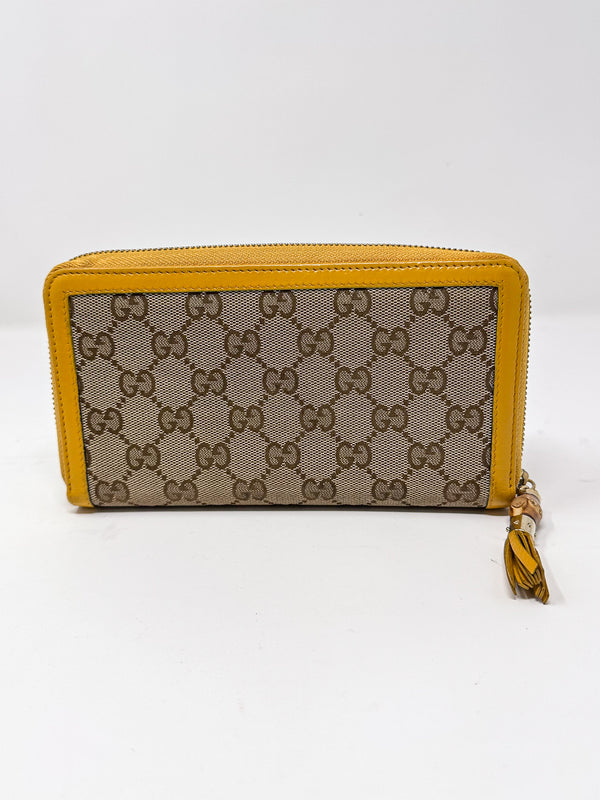 Gucci Bamboo Yellow Tassel Zip Around Wallet
