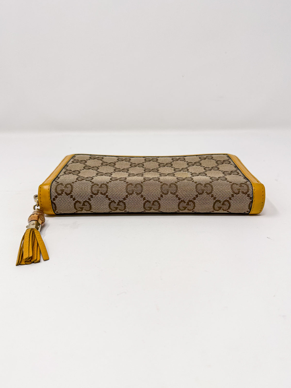 Gucci Bamboo Yellow Tassel Zip Around Wallet