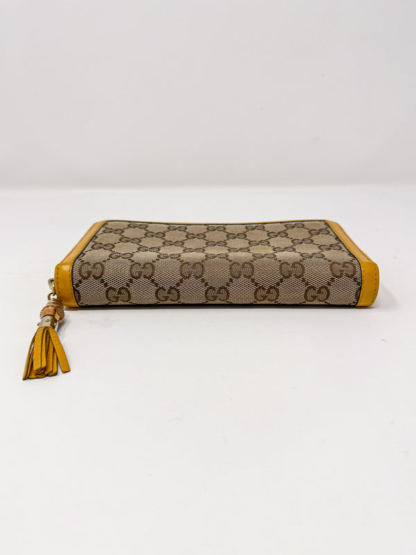 Gucci Bamboo Yellow Tassel Zip Around Wallet